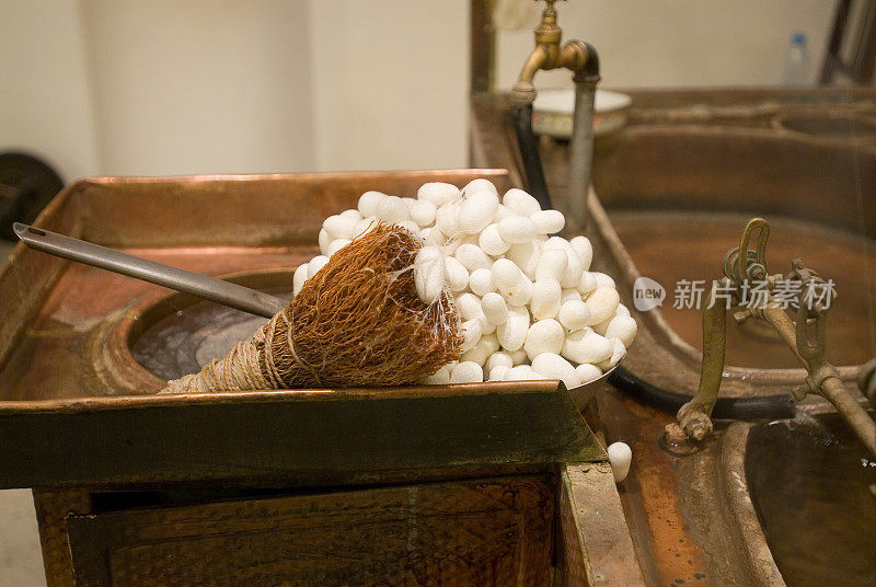 Silkworm cocoons. Silk rope production process. Making of silworm.